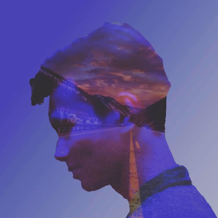 Double-exposure portrait with a dusk road